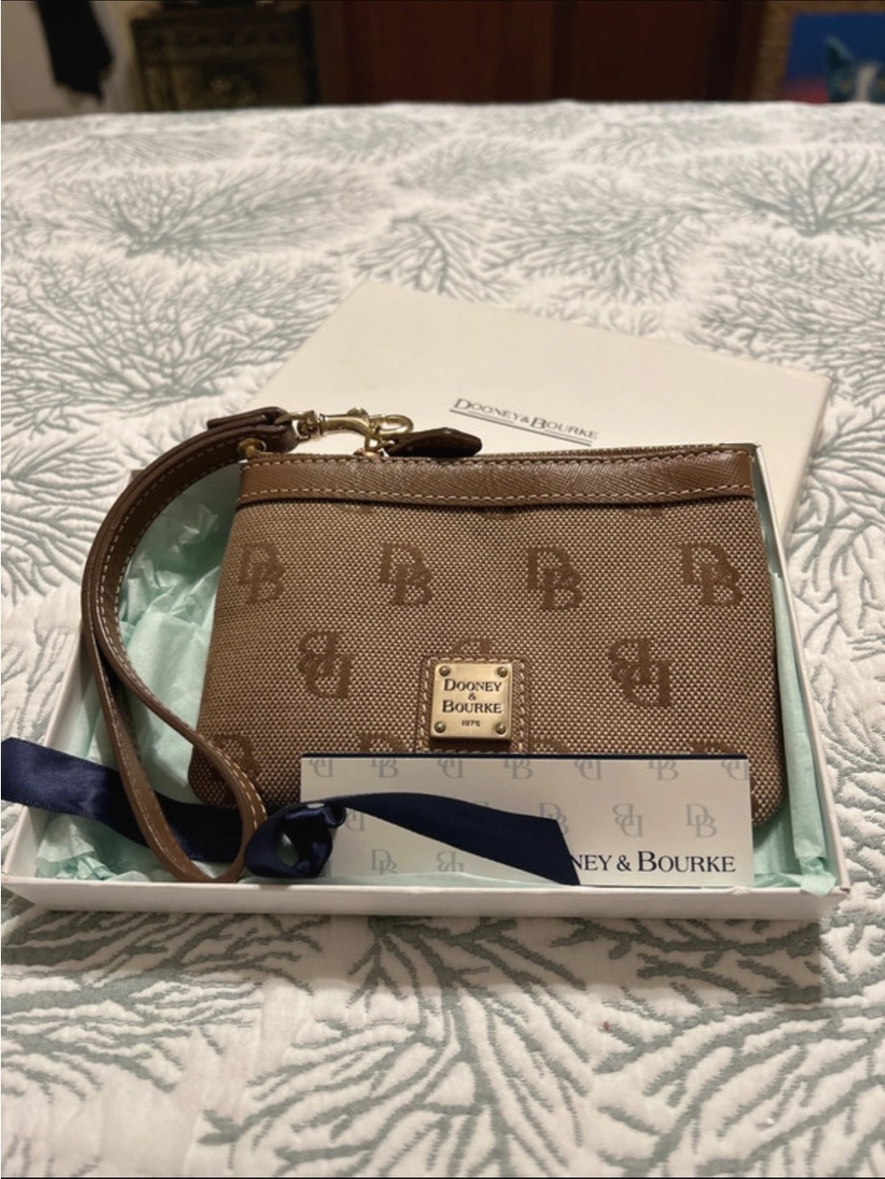 Dooney & Bourke Tan/Brown Signature Wristlet with Logo Plaque